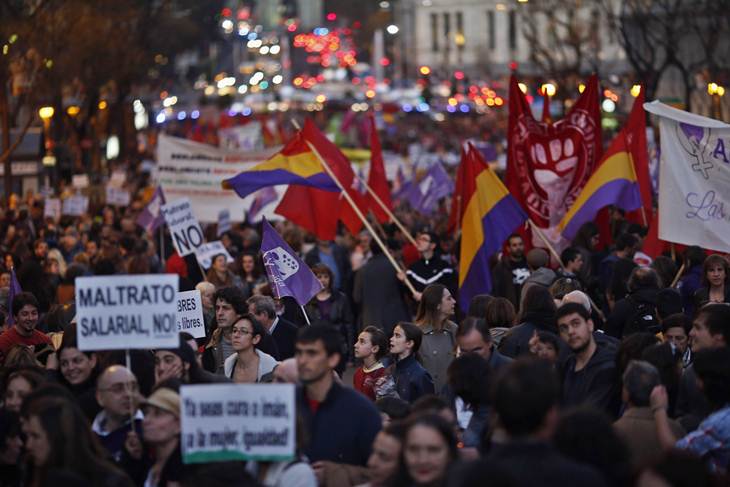 Girls take part in a Women's Day march in Madrid